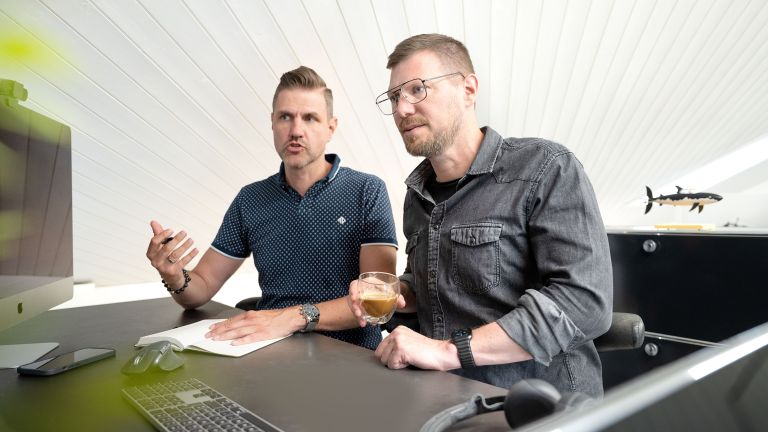 Alain und Martin am Desktop